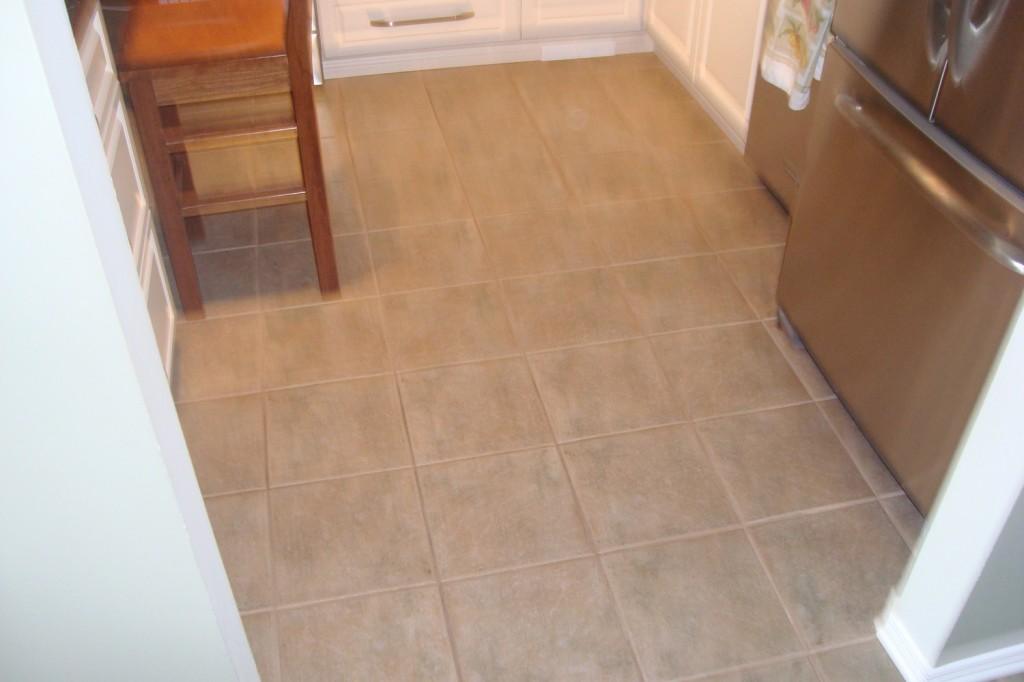 brown wooden cabinet on brown floor tiles